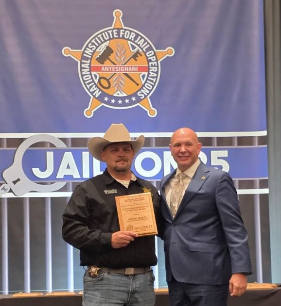 Michael Brisco getting award